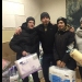 Helping unloading the gifts for the elderly.jpg